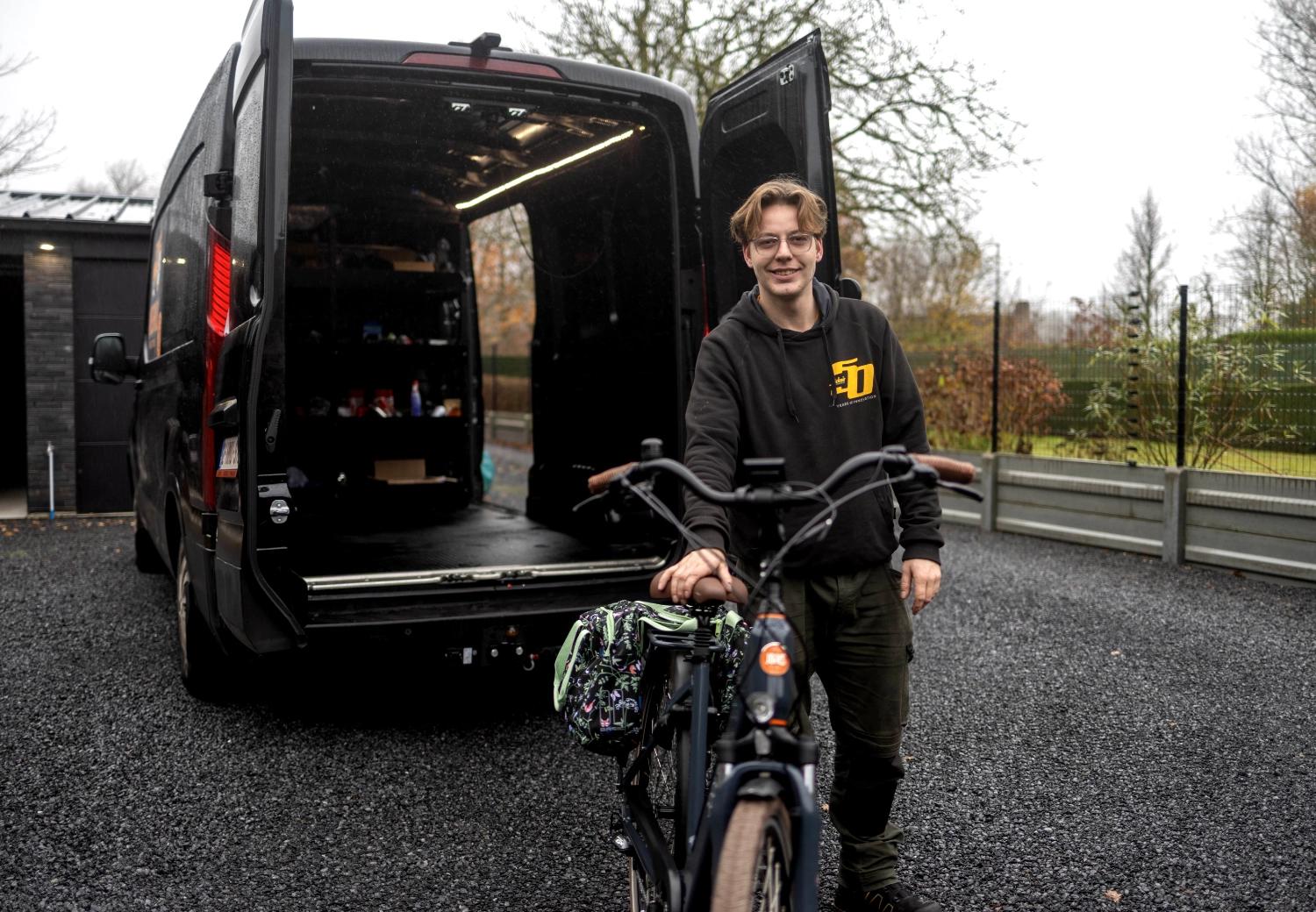 Seth with a bicycle in front of van