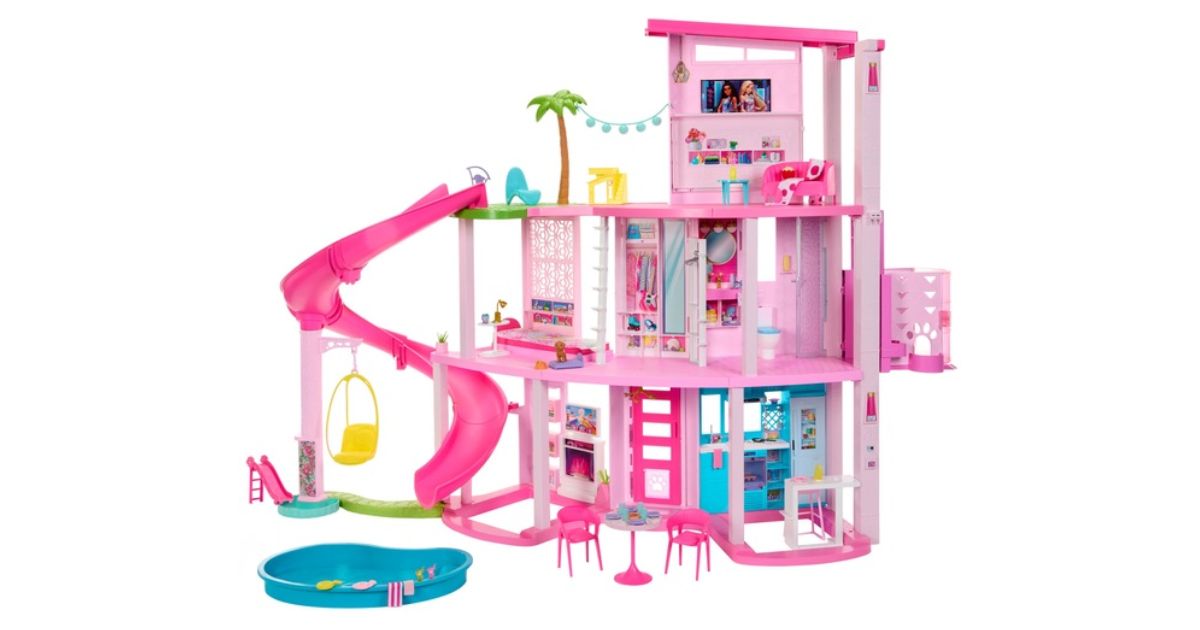 Barbie DreamHouse in pink with a slide down to a blue pool.