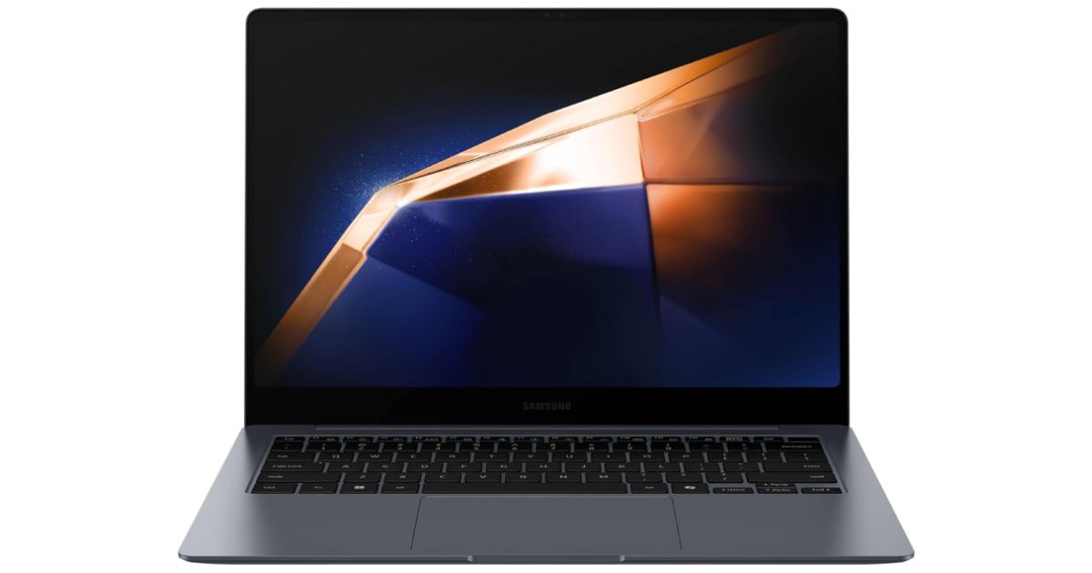 Samsung Galaxy Book4 Pro product image of a dark gray, thin laptop with an orange and dark blue pattern on the display.