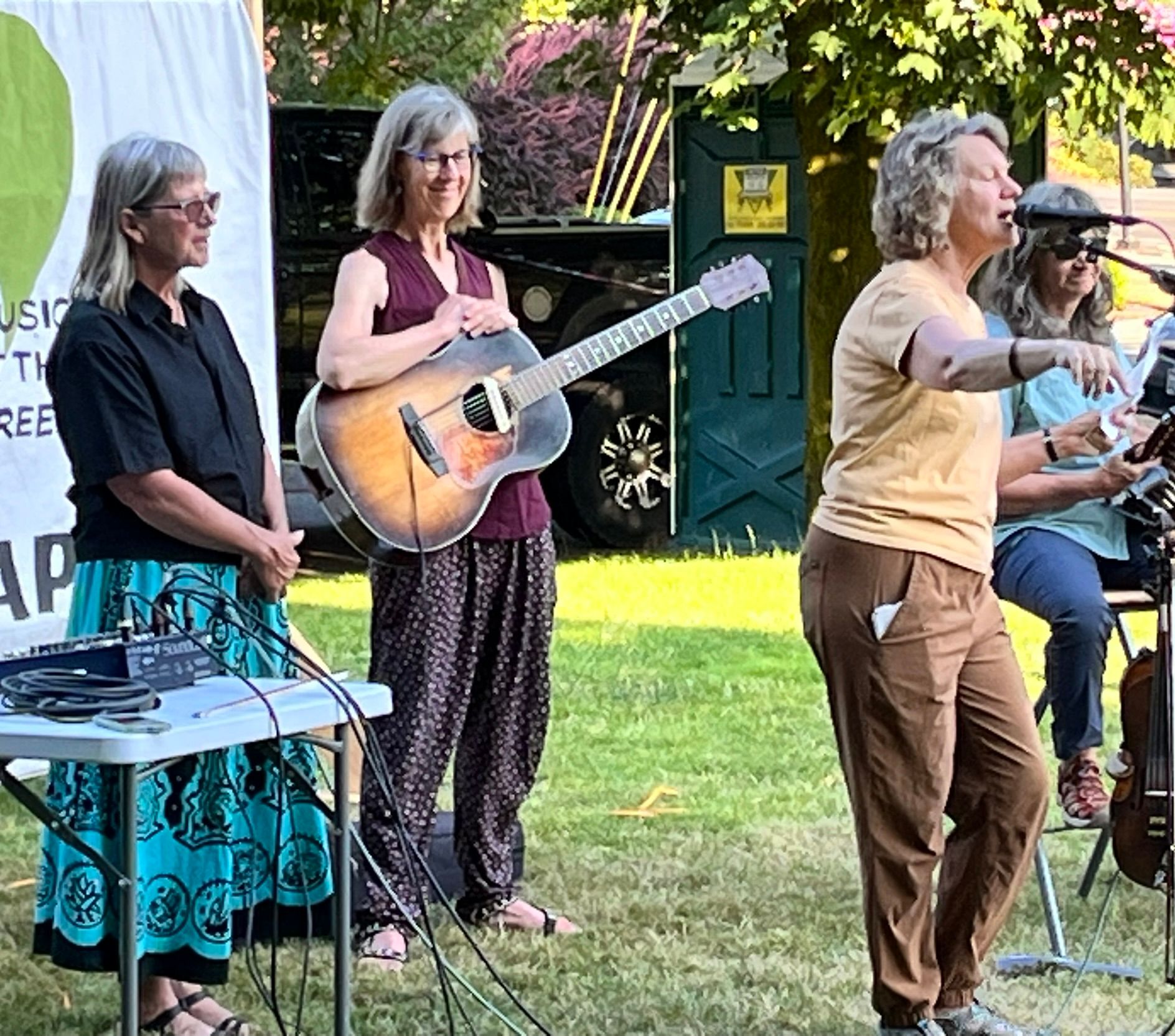 One of our Board members presenting the artists