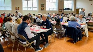 Guests enjoy dinner at St. James' Cathedral Kitchen.