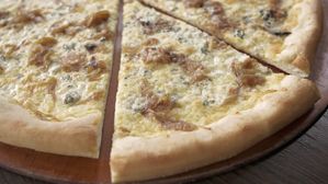 Our Crostata features Walla Walla sweets and a blend of gorgonzola, mozzarella, and fontina cheese.