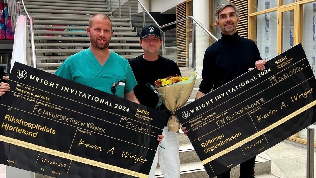 Kevin André Wright with donation cheques from Wright Invitational’s 2024 fundraising.