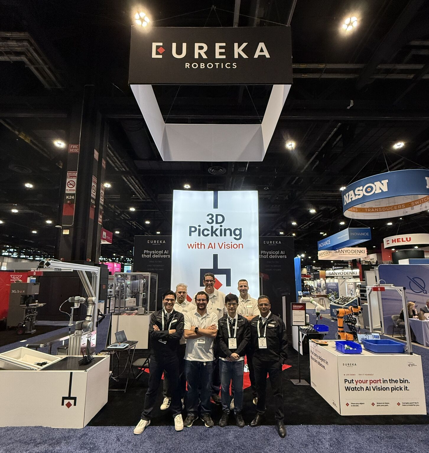 Eureka team at a trade show booth in the US