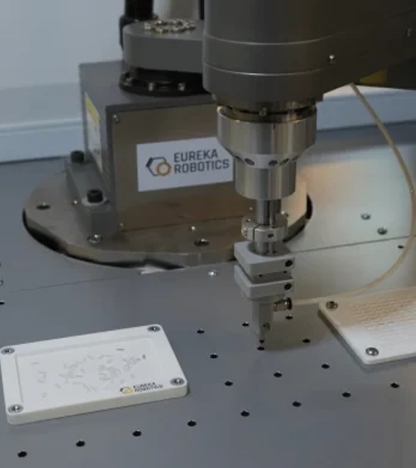 Picking and loading delicate telecom lenses with 2D vision