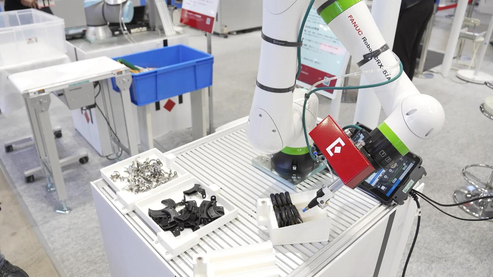 Eureka vision interface showing part detection and a robot cell simulation