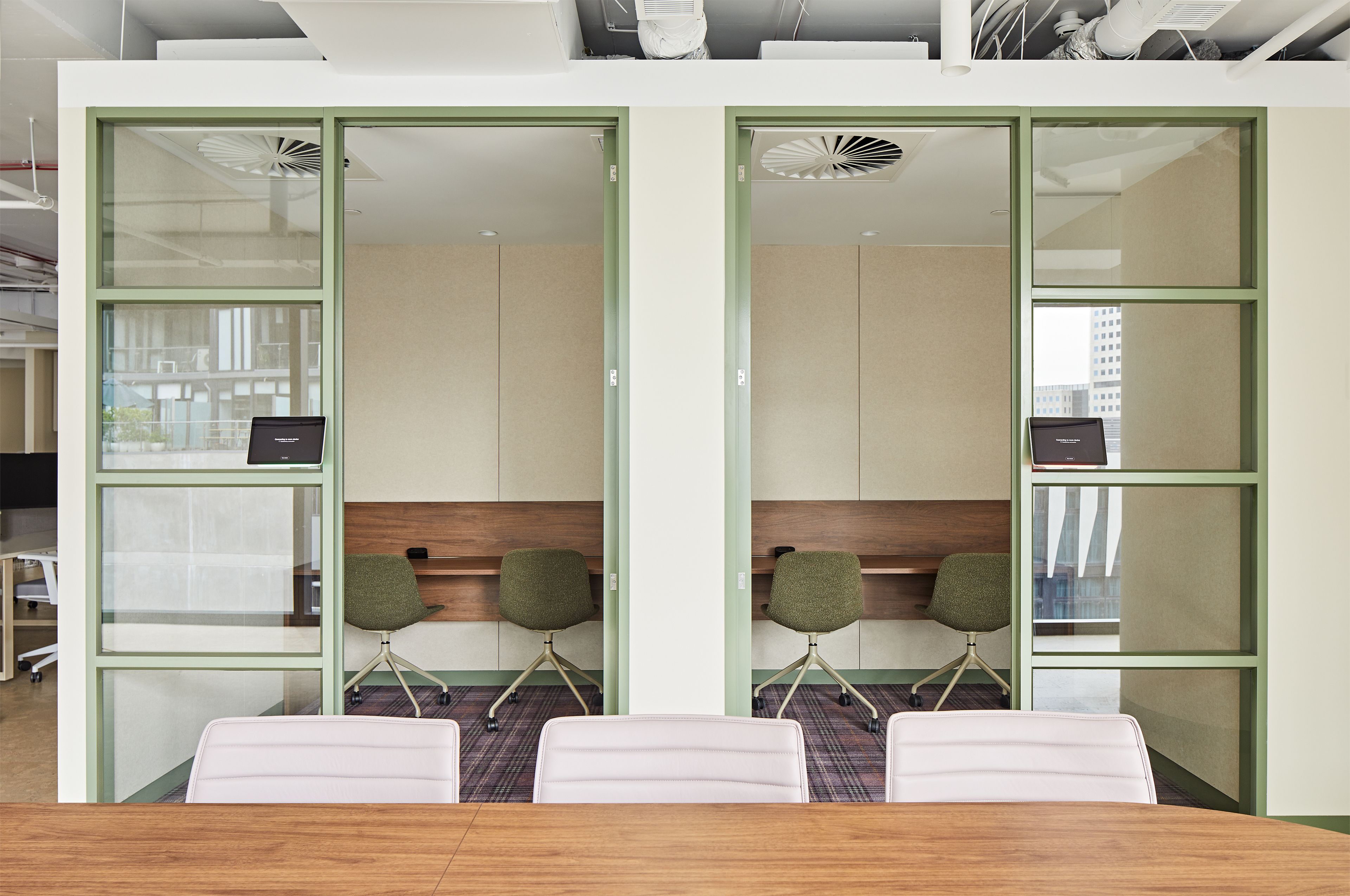 Phone rooms and collab table at Kytec's office.