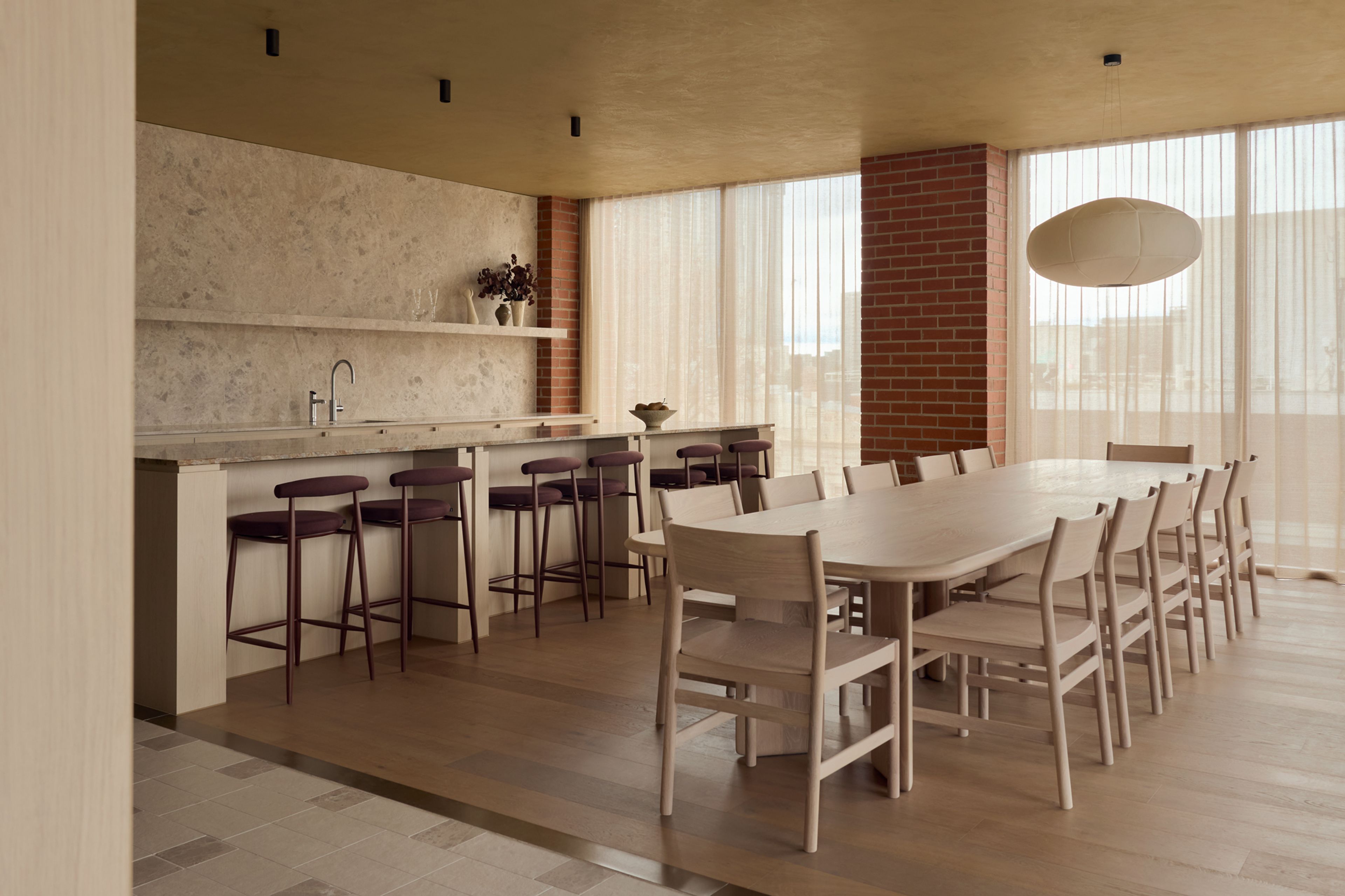 Breakout and kitchen area in workplace design for Lowe Living at Emerald Place in South Melbourne.