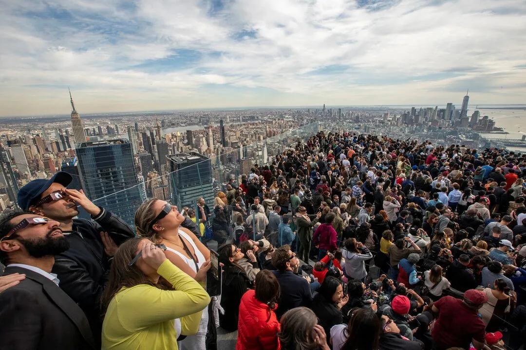 Total solar eclipse: North Americans celebrate with cheers, music and  matrimony | Reuters