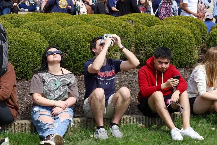 Students at Robert Morris University gather for eclipse viewing