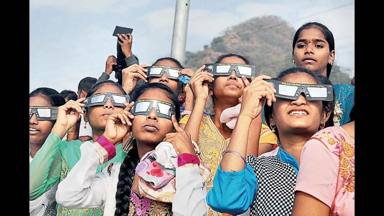 LookUp: Vizagites make the most of the last solar eclipse of the decade | Visakhapatnam News - Times of India