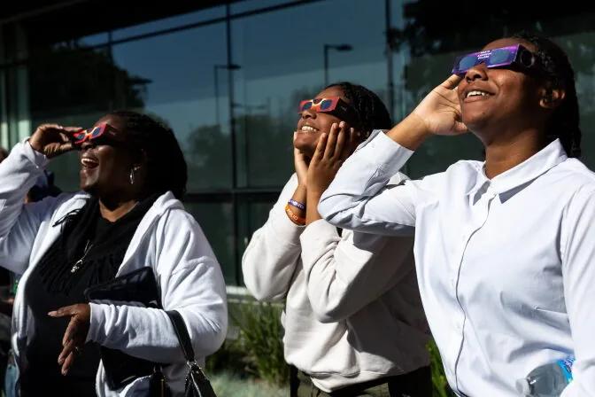 People across Southern California gather to take in solar eclipse | LAist