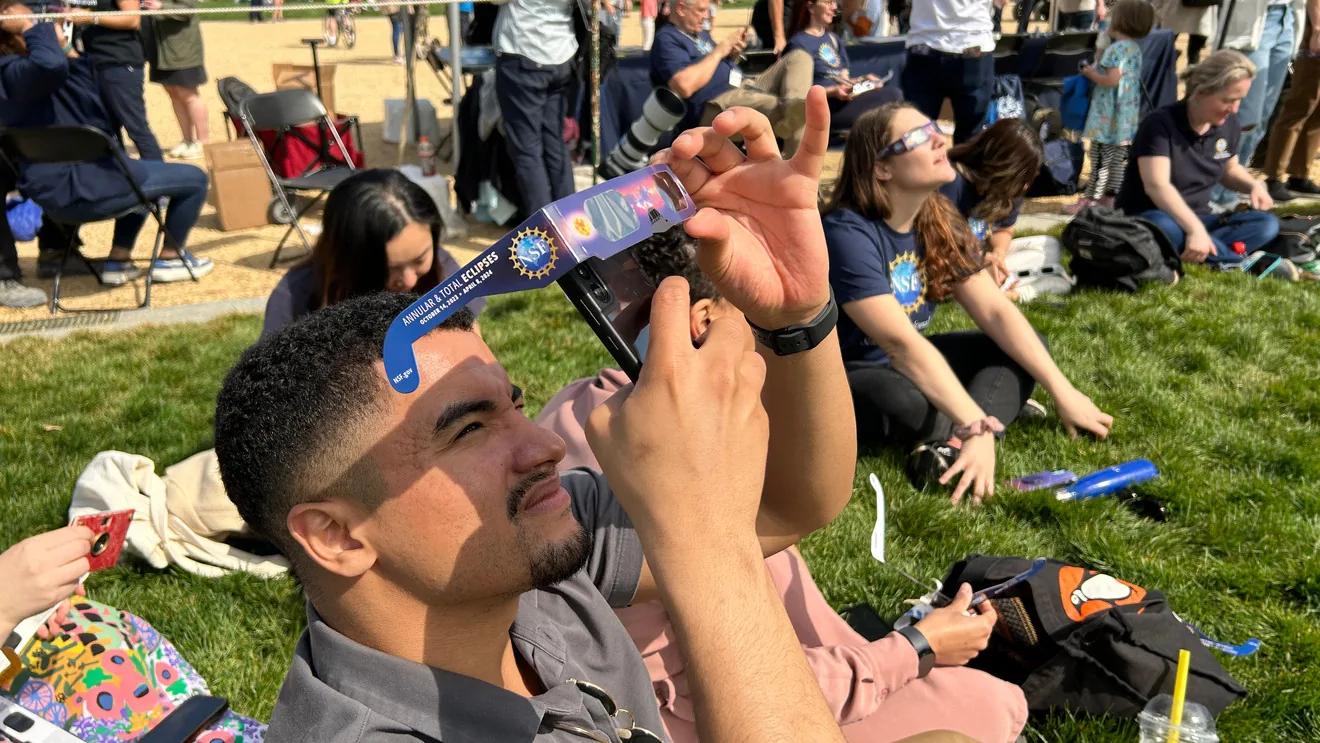 SEE IT: Thousands gather to see partial solar eclipse across ...