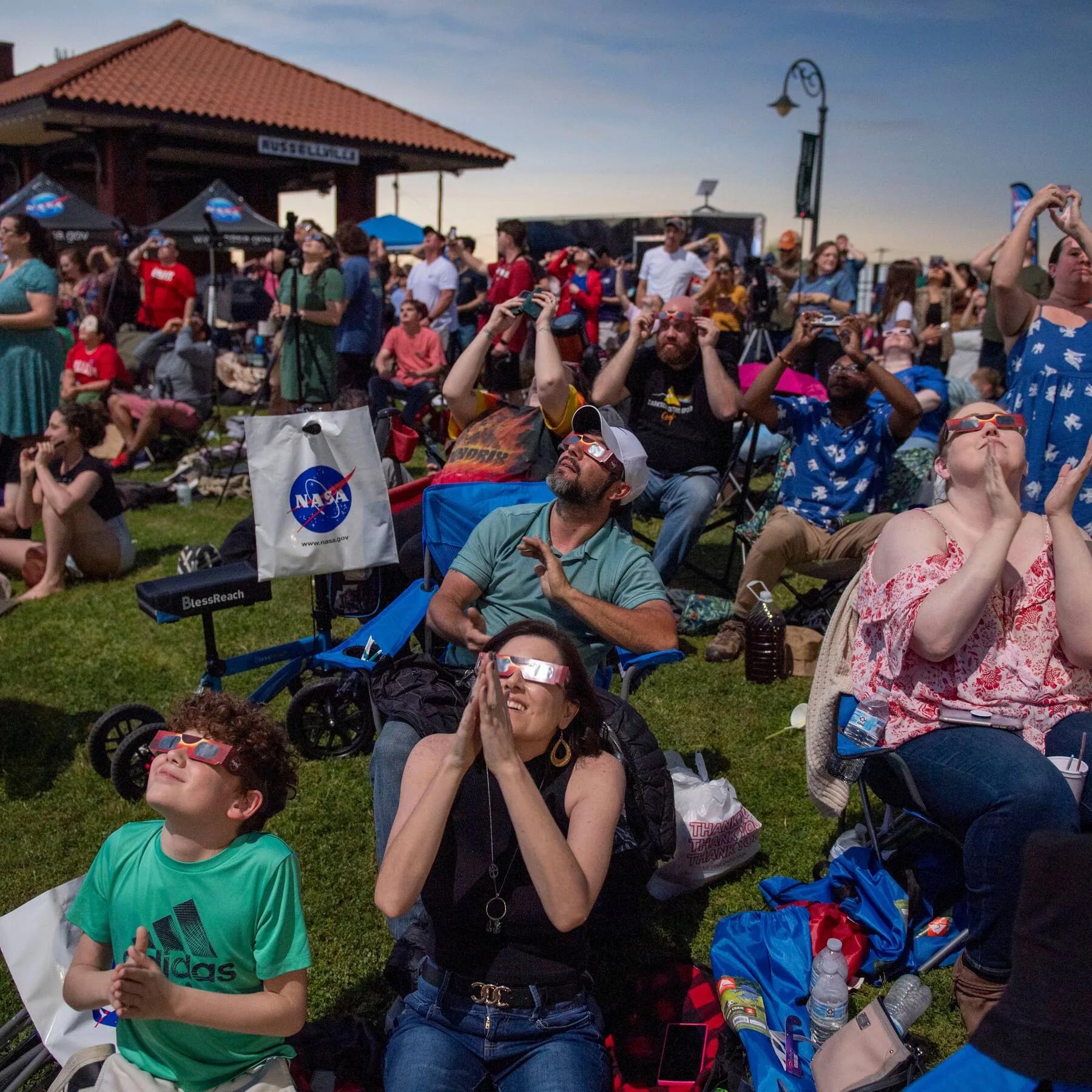 Clouds part and crowds scream as total solar eclipse ...