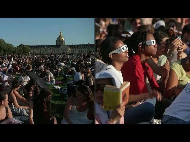 Crowd gathers in Paris to watch the solar eclipse | AFP - YouTube