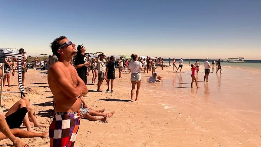 Thousands in awe as solar eclipse hits totality over the skies of ...