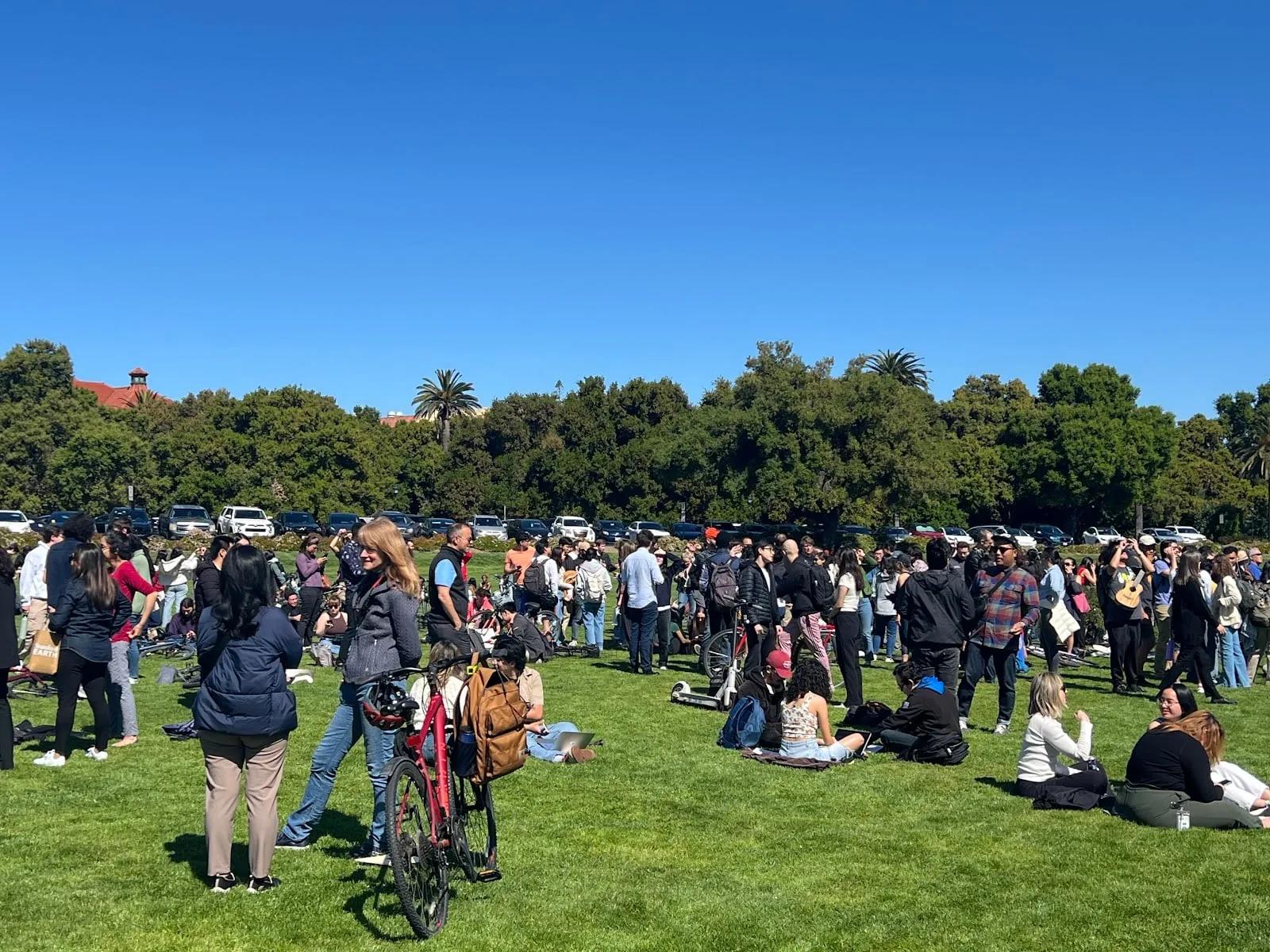 Hundreds watch partial solar eclipse at Oval
