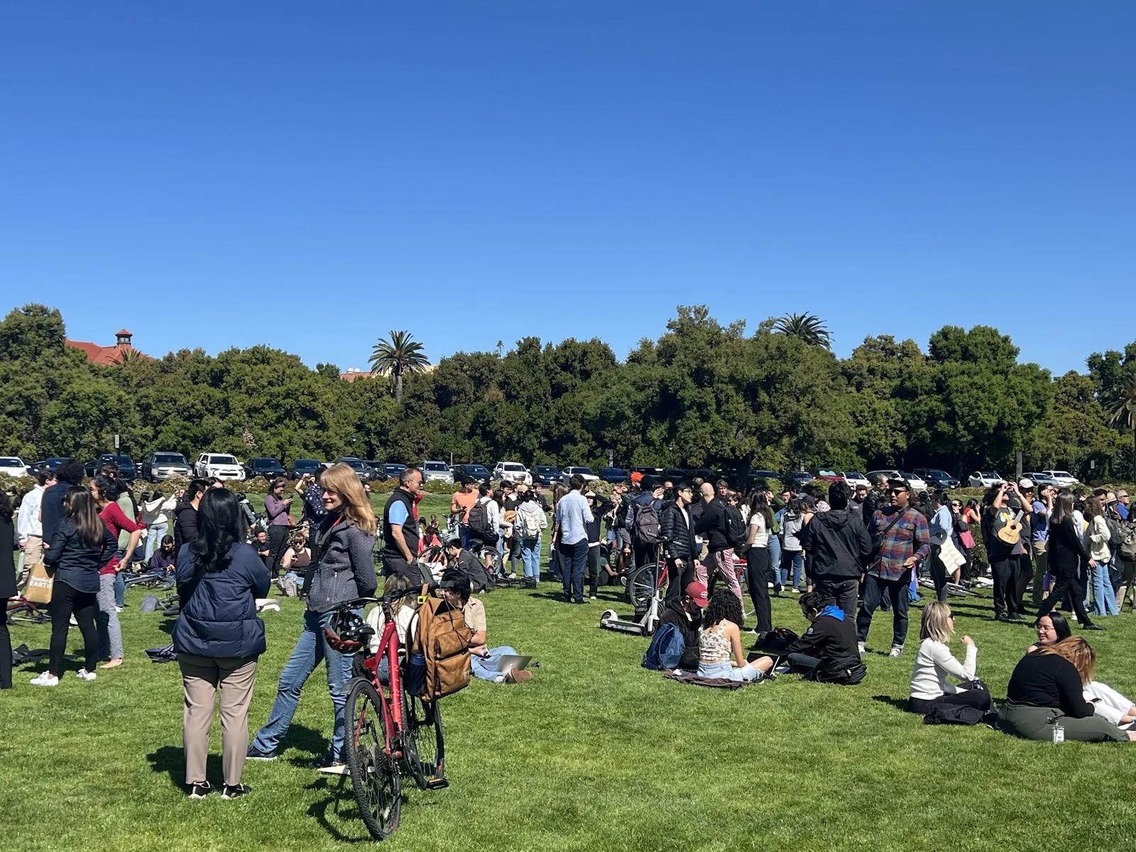 Hundreds watch partial solar eclipse at Oval