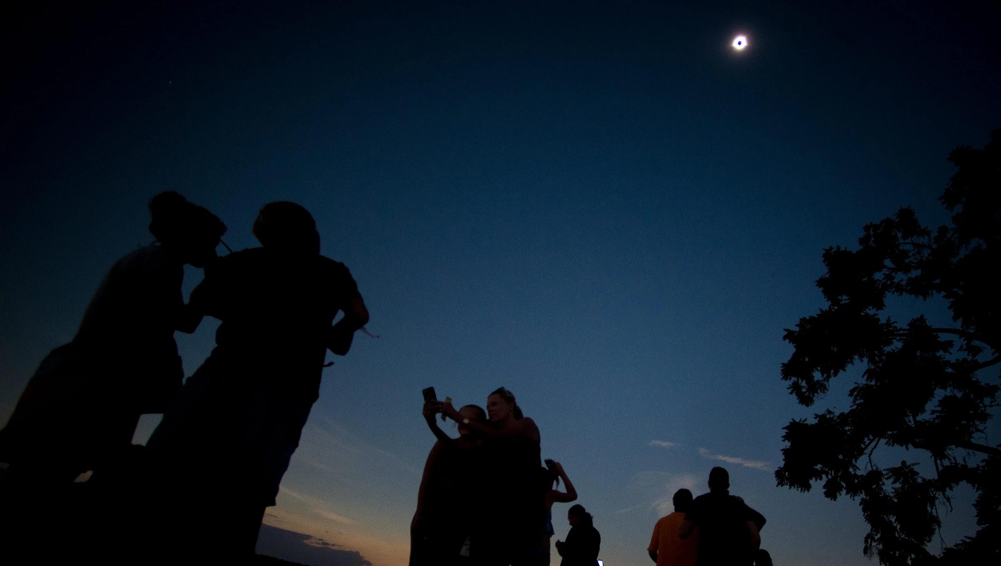 2017 solar eclipse: The Cove broke out in applause as the eclipse darkened the sky