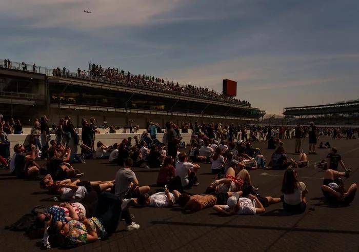 Spectators watch the total solar eclipse at Indianapolis Motor Speedway