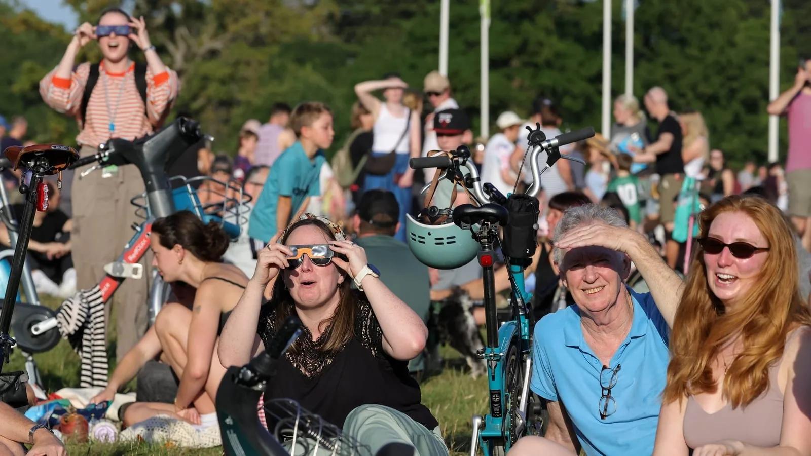 In pictures: Thousands watch rare solar eclipse