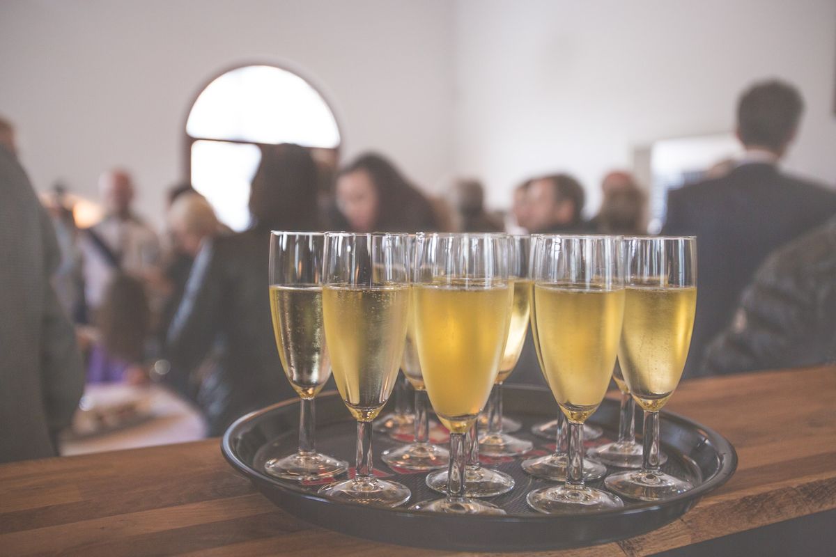 Image of champagne reception tray at corporate event