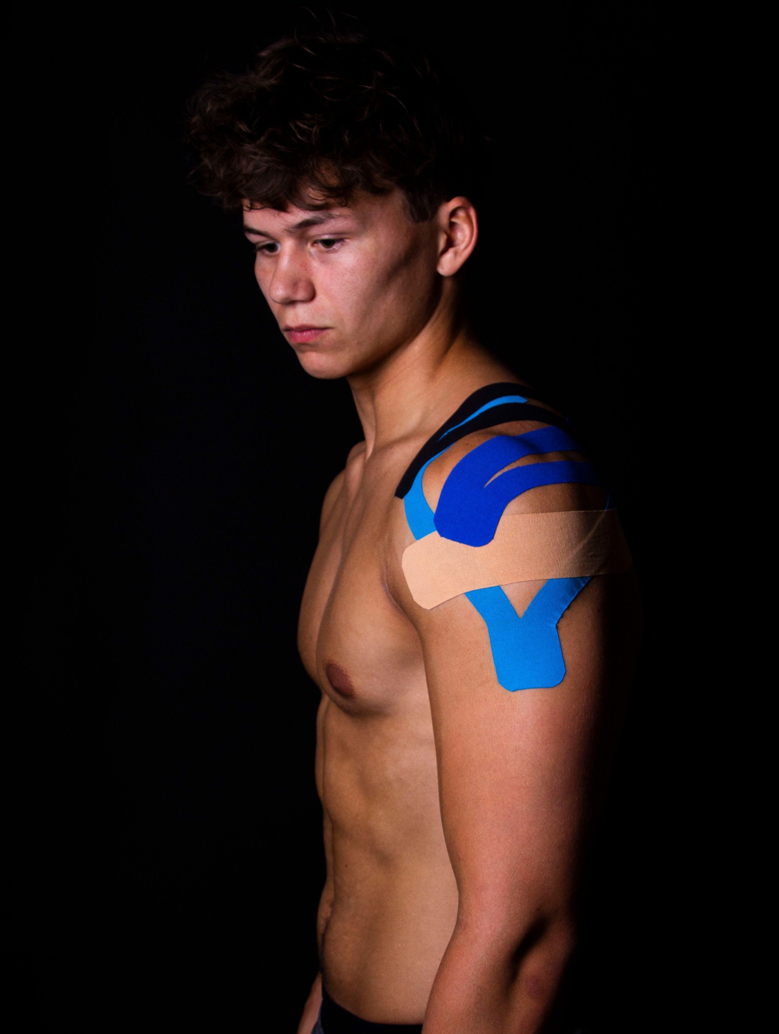 gladiator sports kinesiology strips worn on arm
