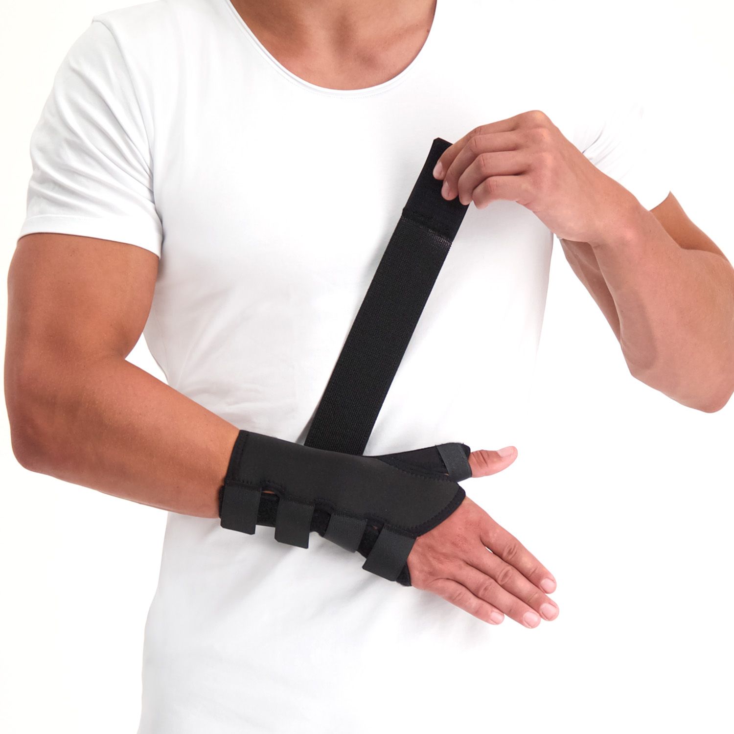 Model strapping the Novamed Thumb Support / Wrist Splint around right wrist