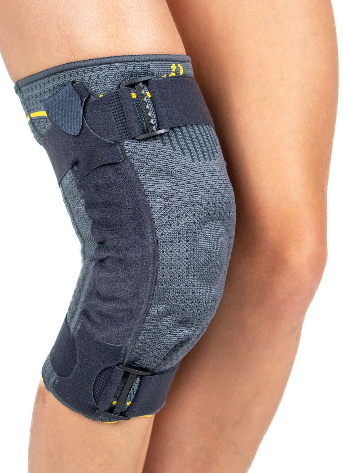 Left side view of model wearing the Morsa GenuBerg M4 Hinged Knee Support around right knee