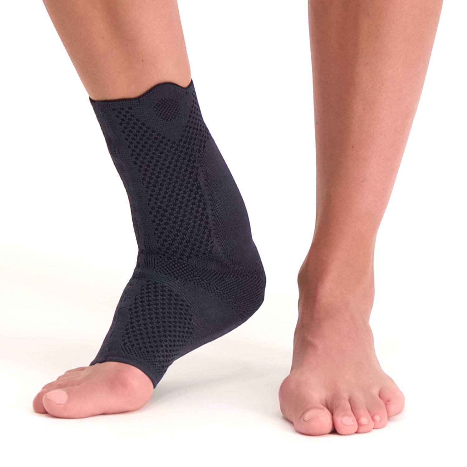 Front view of model wearing the Lyon Achilles Tendon Support around the right foot