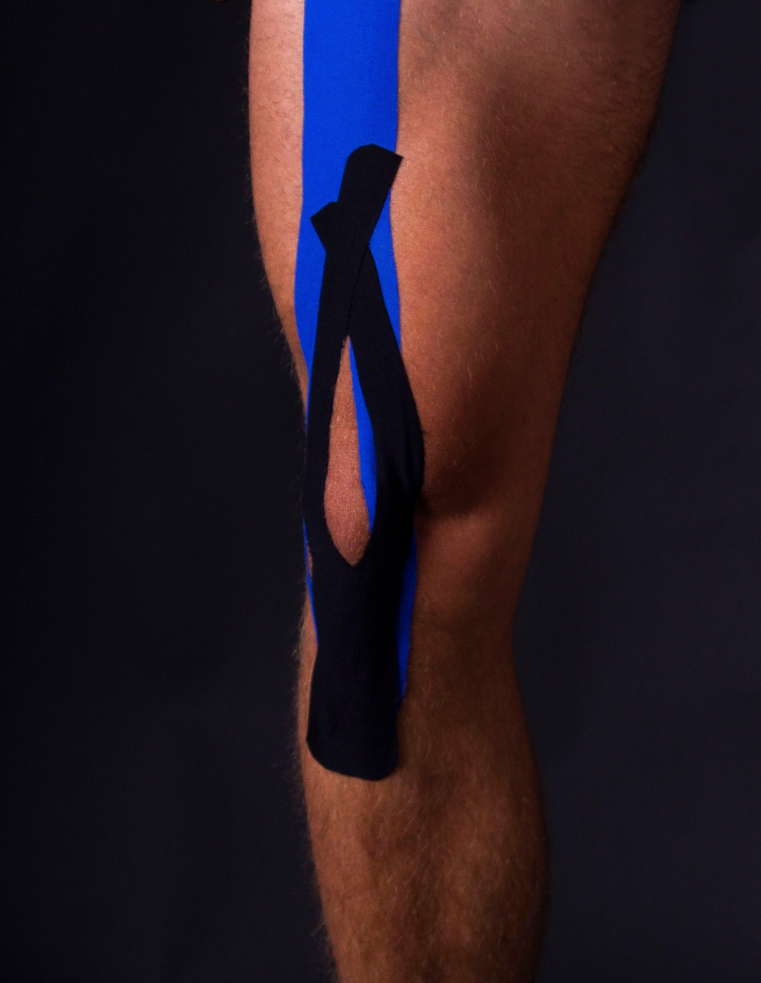 gladiator sports kinesiology strips worn around knee