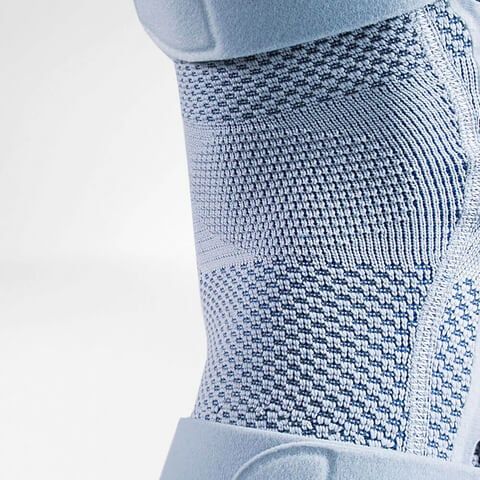 Zoomed-in photo showing the knitting pattern of the Bauerfeind GenuTrain S Hinged Knee Support