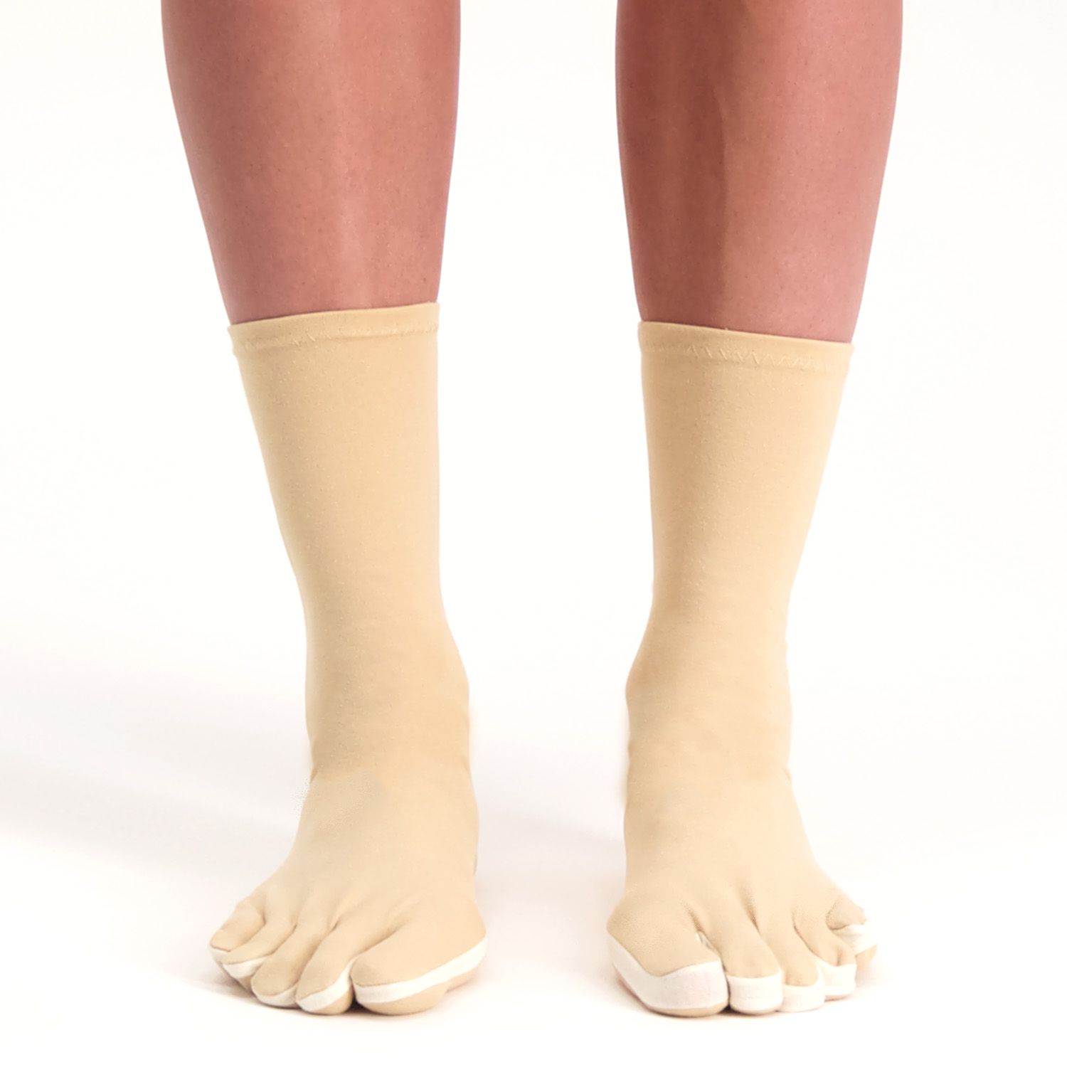 Front view of model wearing the Raynaud's Disease / Osteoarthritis Socks in Beige