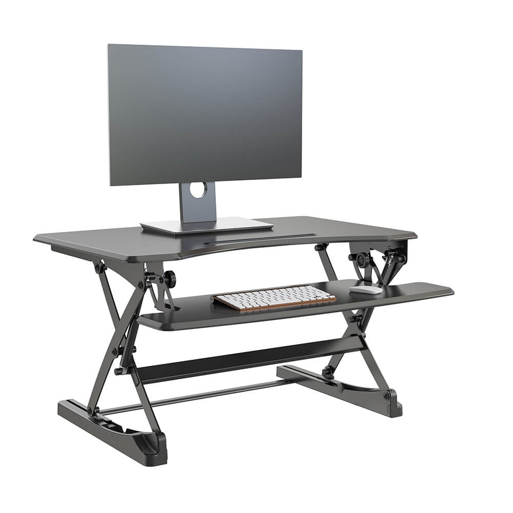 folded out in height adjustable desk with computer on it