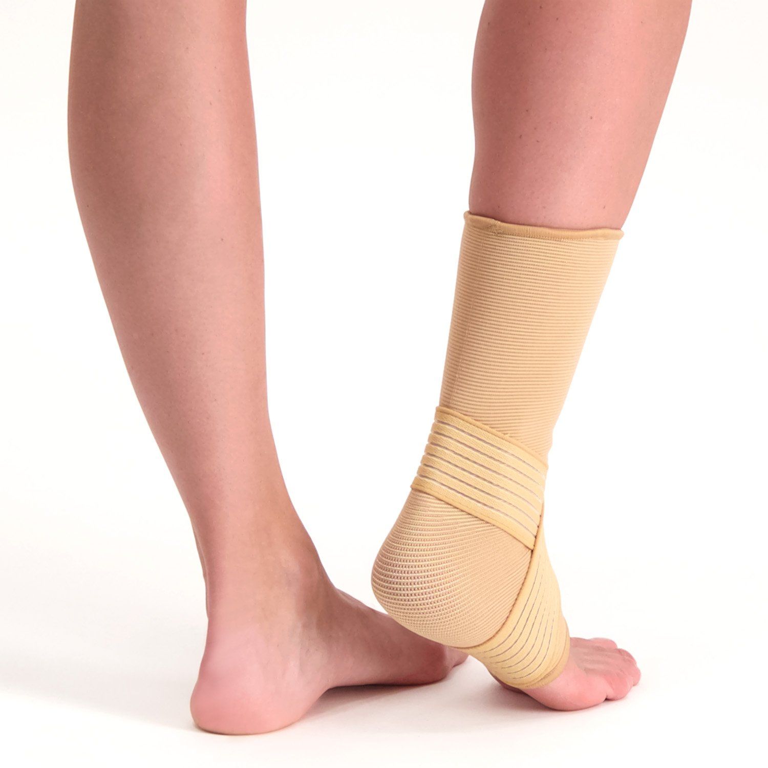 Back side view of model wearing the Dunimed Premium Ankle Support Beige