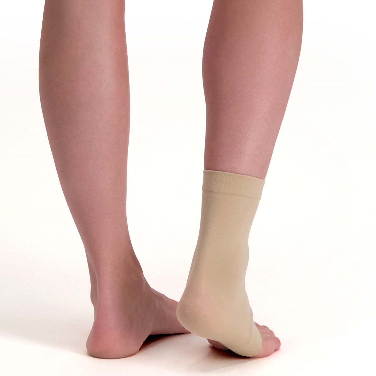 Back view of model wearing the Solelution Ankle Gel Sock around right ankle