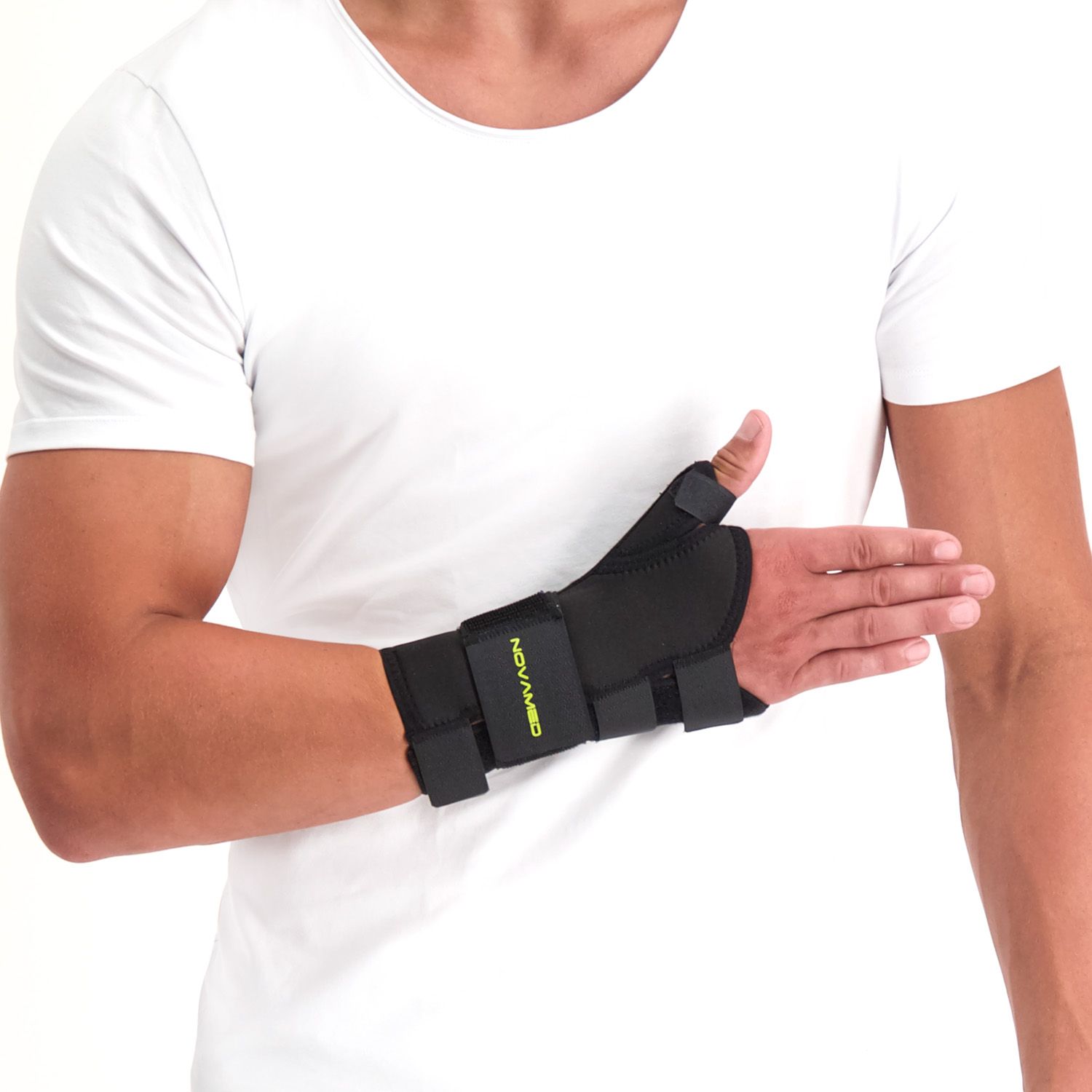 Front view of model wearing the Novamed Thumb Support / Wrist Splint around the right wrist and thumb