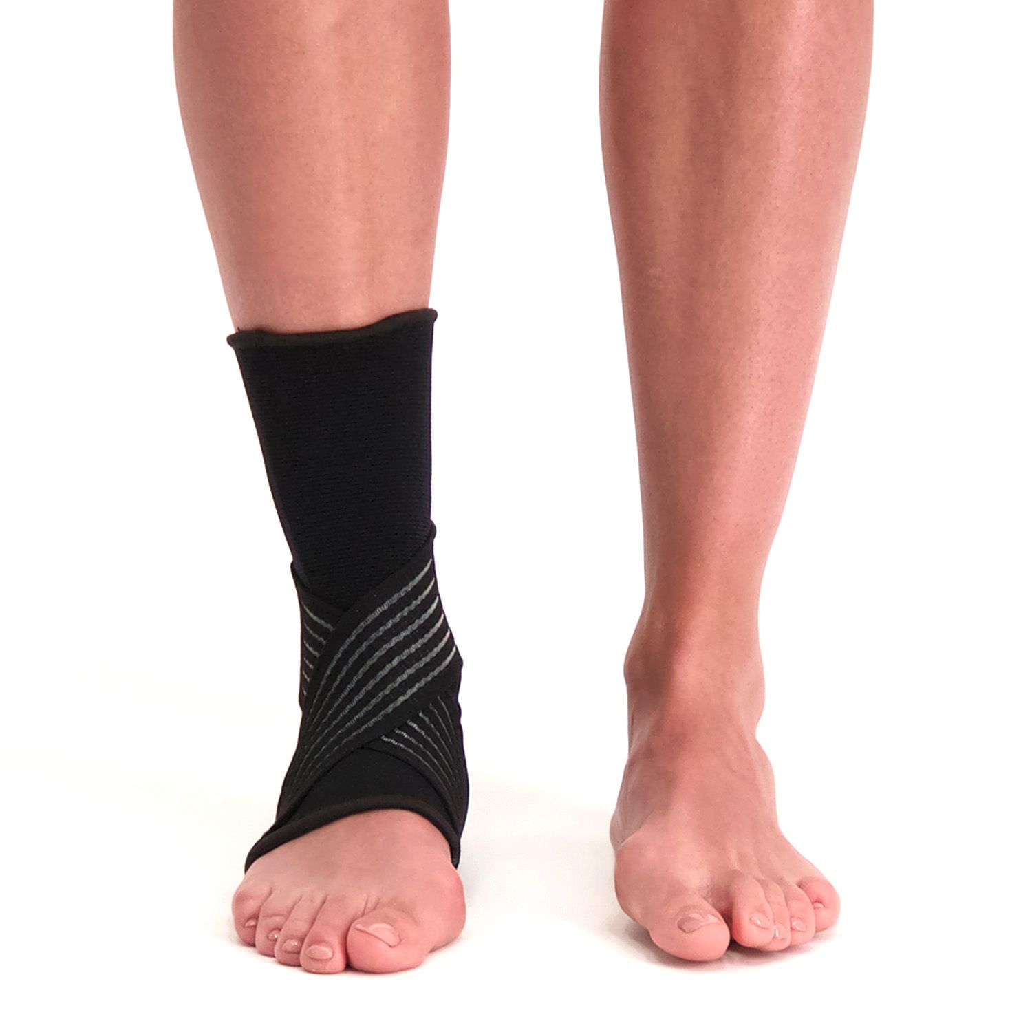 Front view of model wearing the Medidu Premium Ankle Support in Black around the right ankle