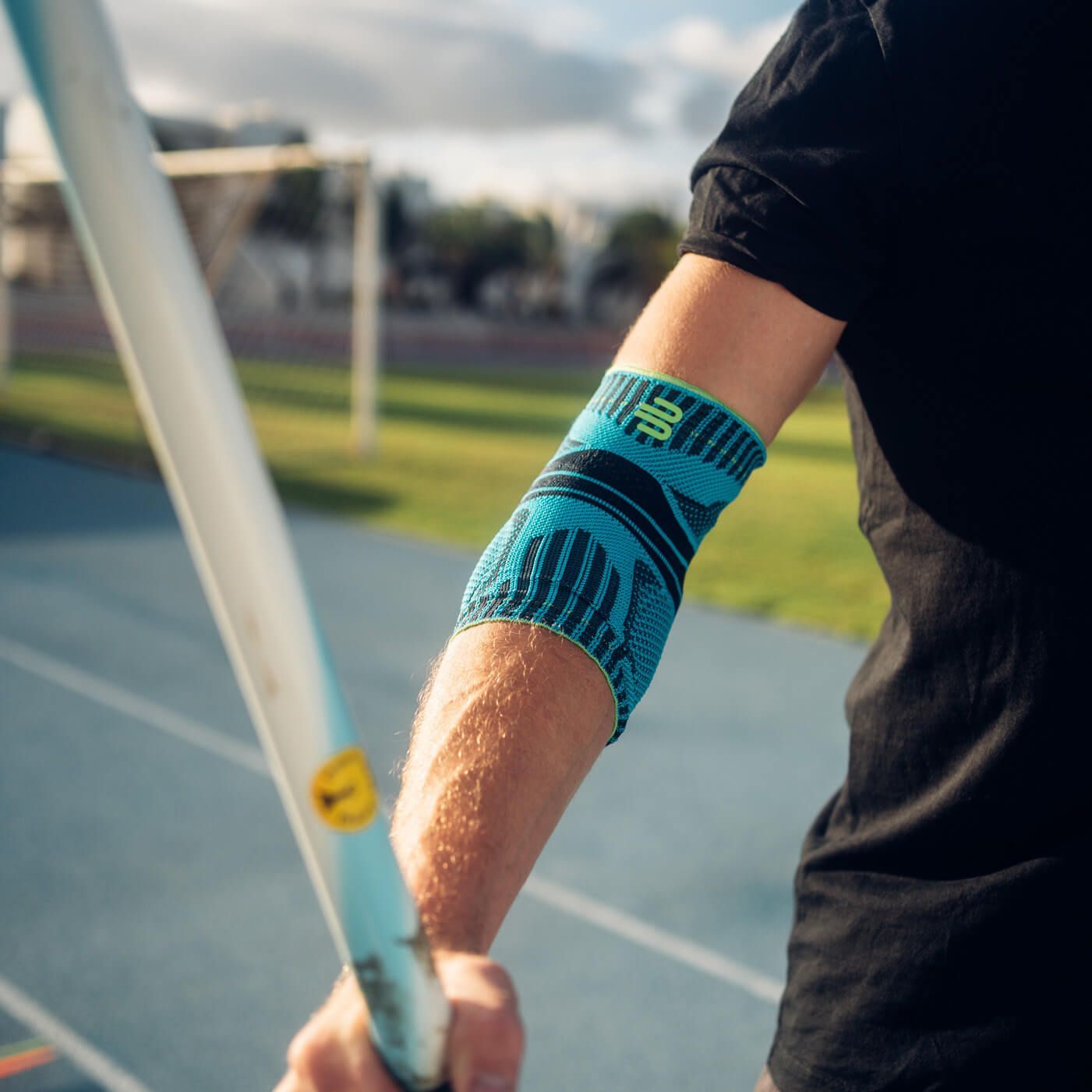 Bauerfeind Sports elbow brace worn on the right arm