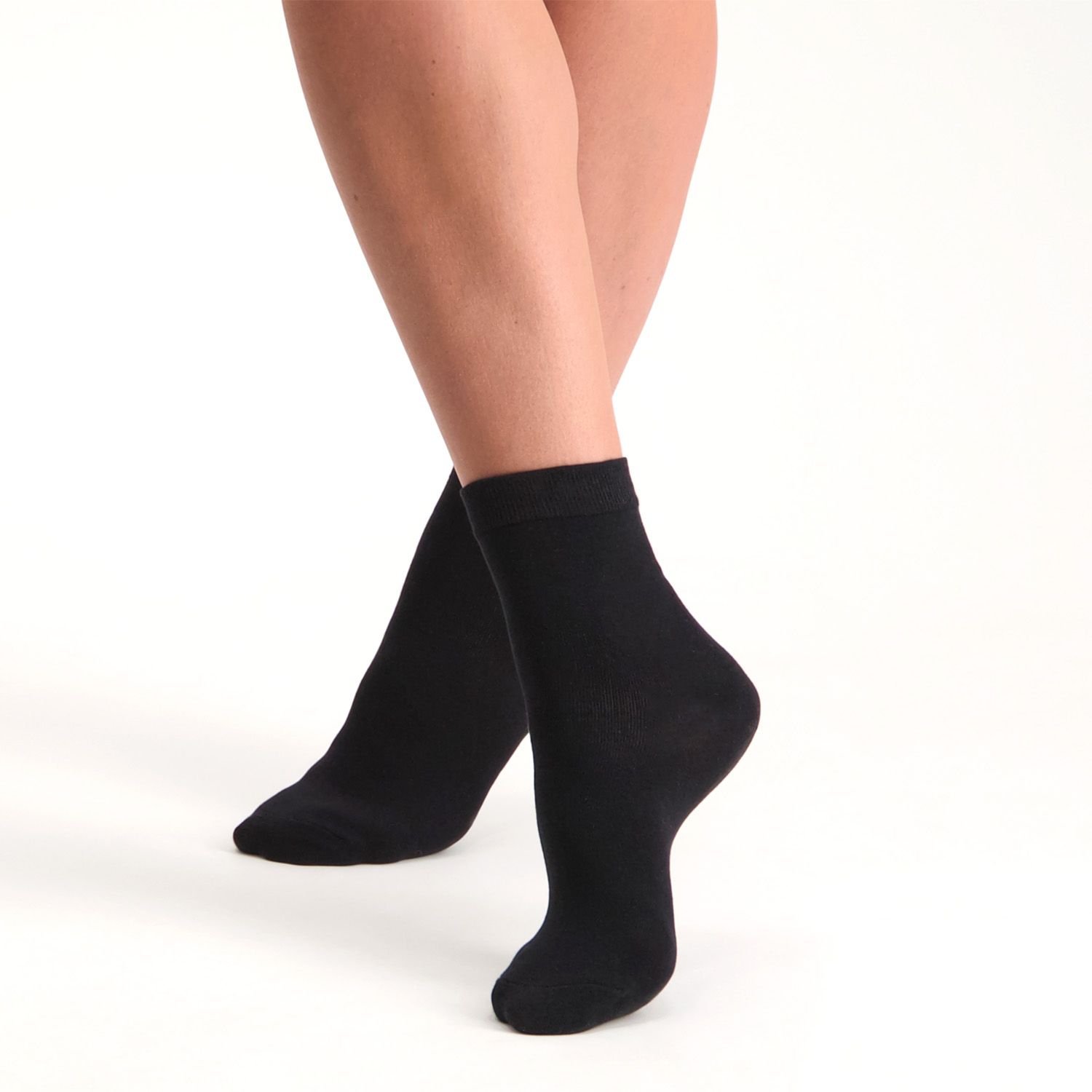 Front view of model wearing the Solelution Socks with Silicone Gel Heel