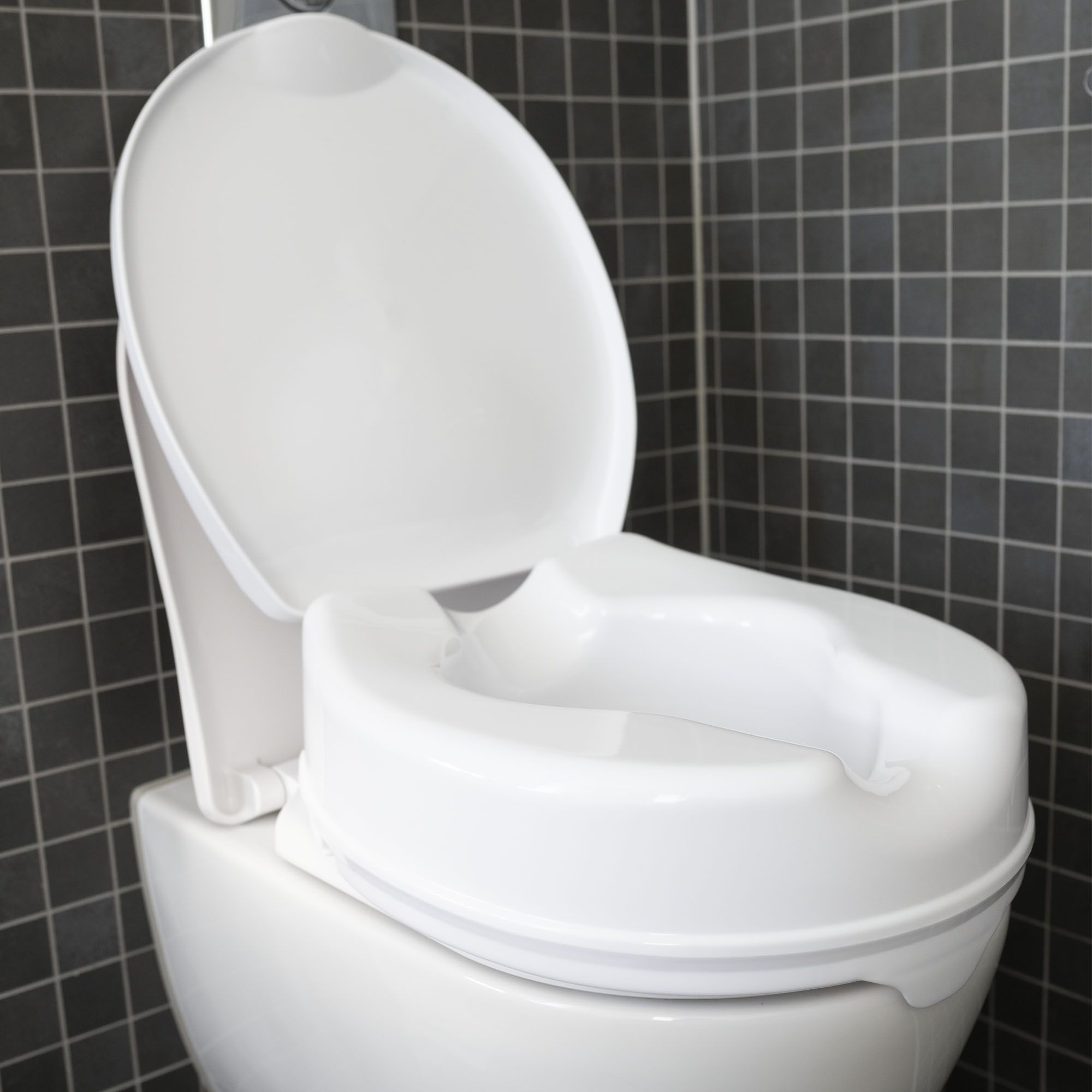 dunimed raised toilet seat mounted on toilet