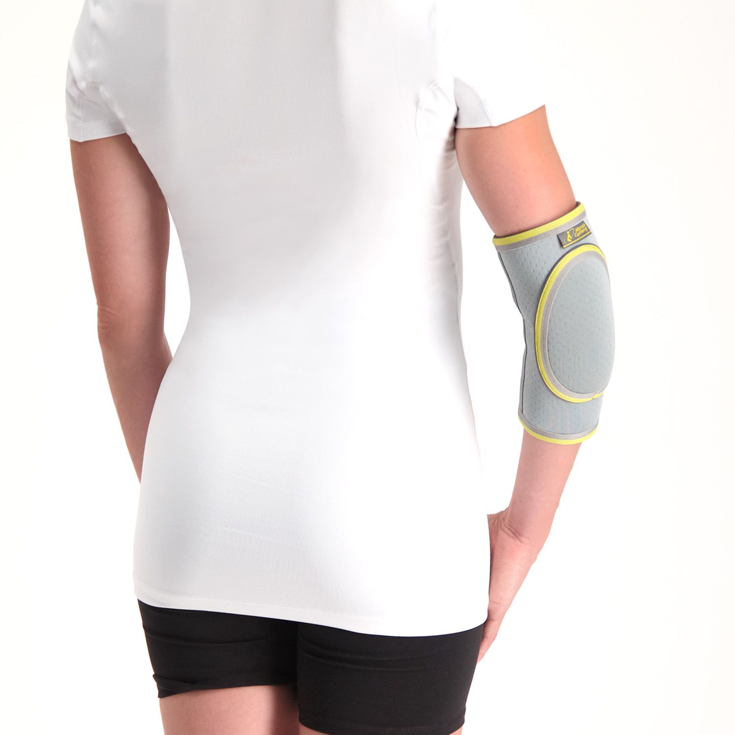 Back view of model wearing the Morsa Elbow Pad around the right elbow