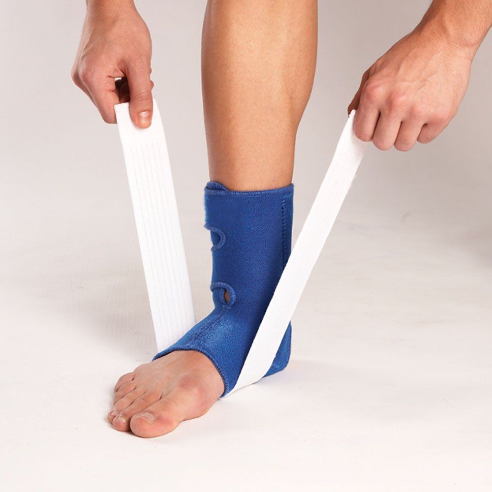 Model fastening the straps of the LP Support 775 Ankle Support
