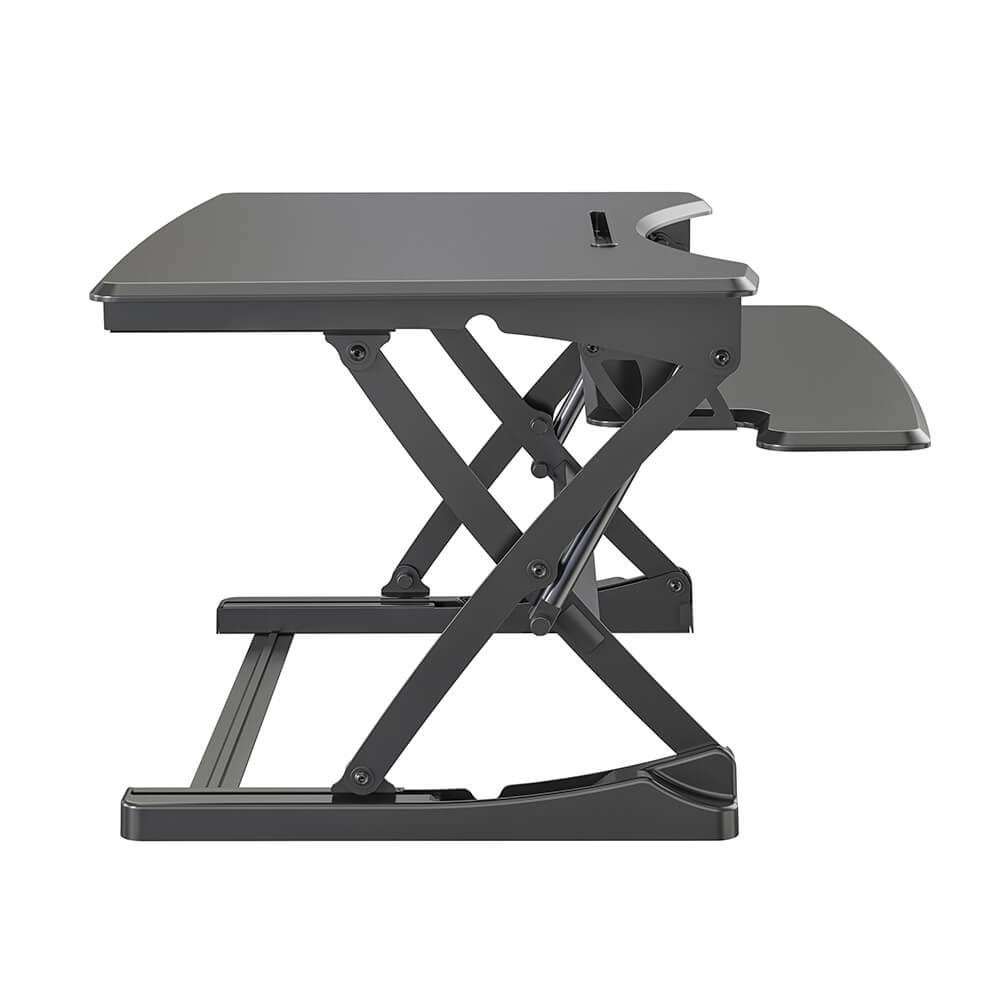 in height adjustable desk side view
