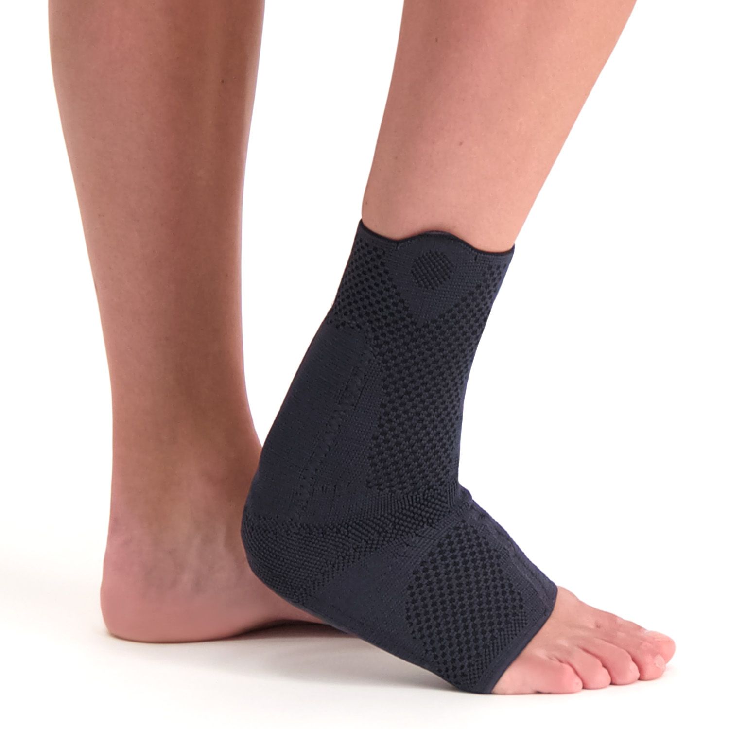 Side view of model wearing the Lyon Achilles Tendon Support around the right foot