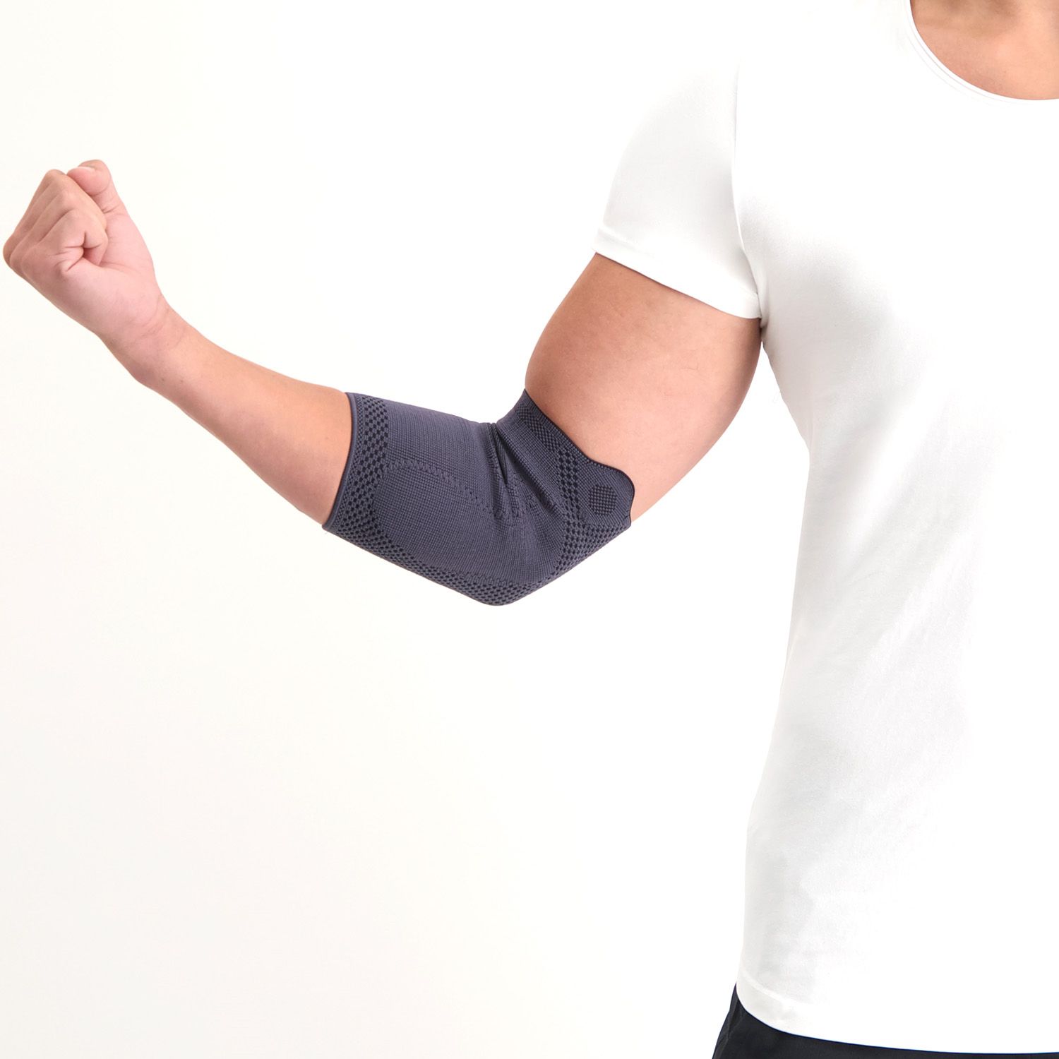 Model wearing the Lyon Premium Elbow Support with a flexed arm