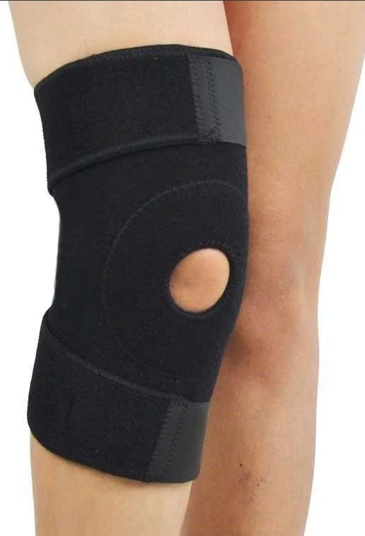 Front view of model wearing the Medidu Knee Support Wrap around the right knee