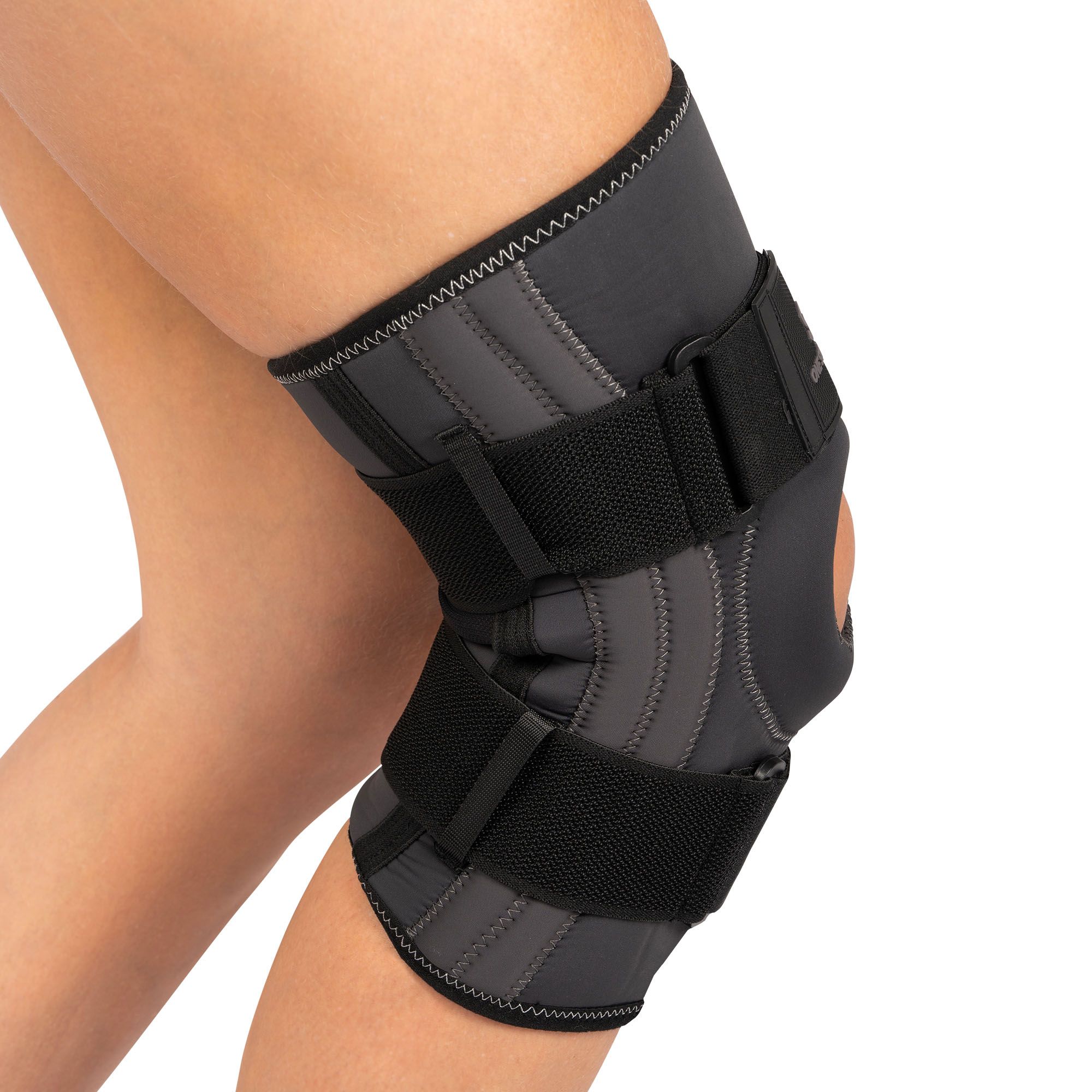 One Support Knee Support with Busks worn around right knee with knee flexed