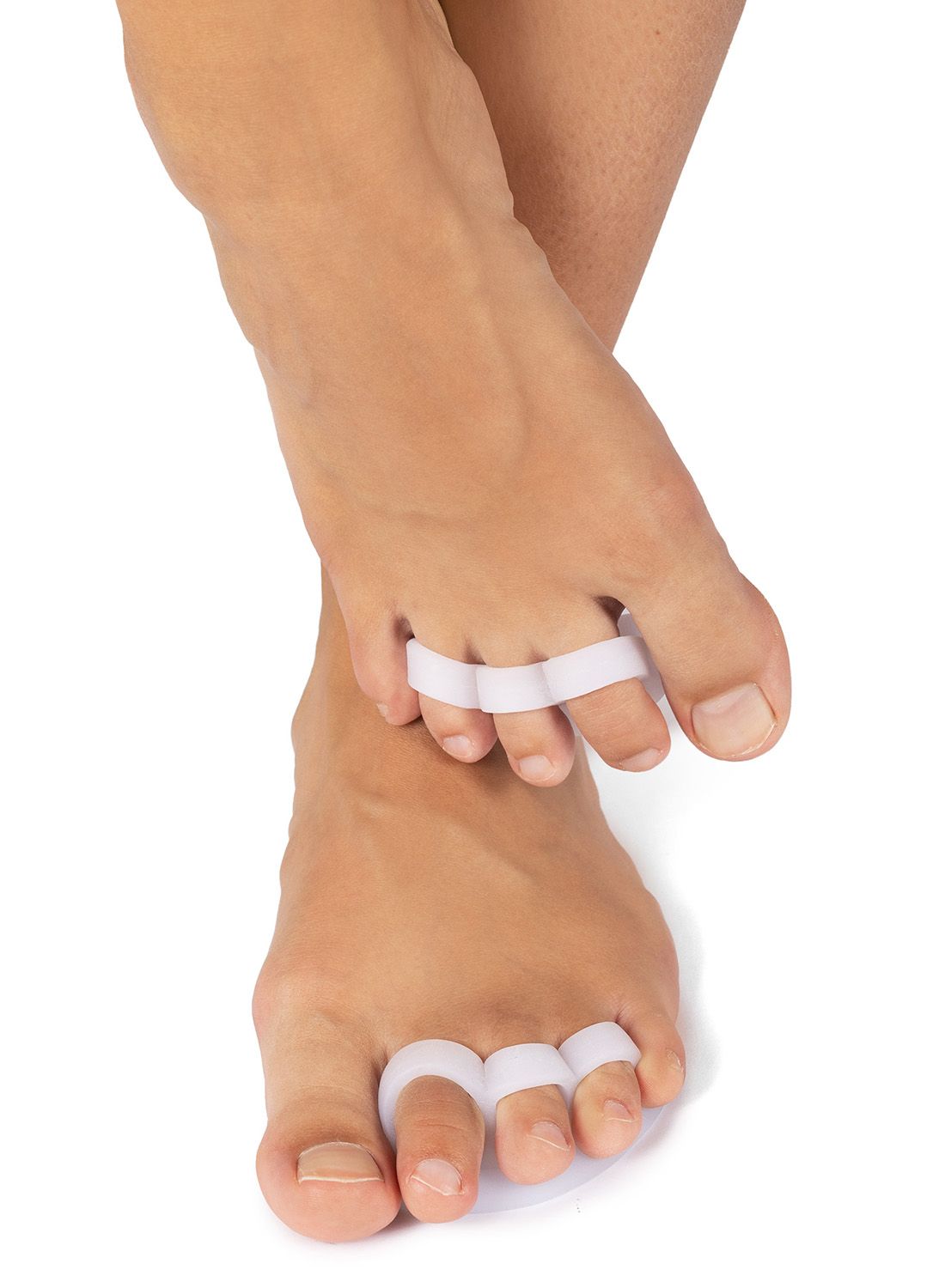 Top view of model wearing the Toe Separators around both feet