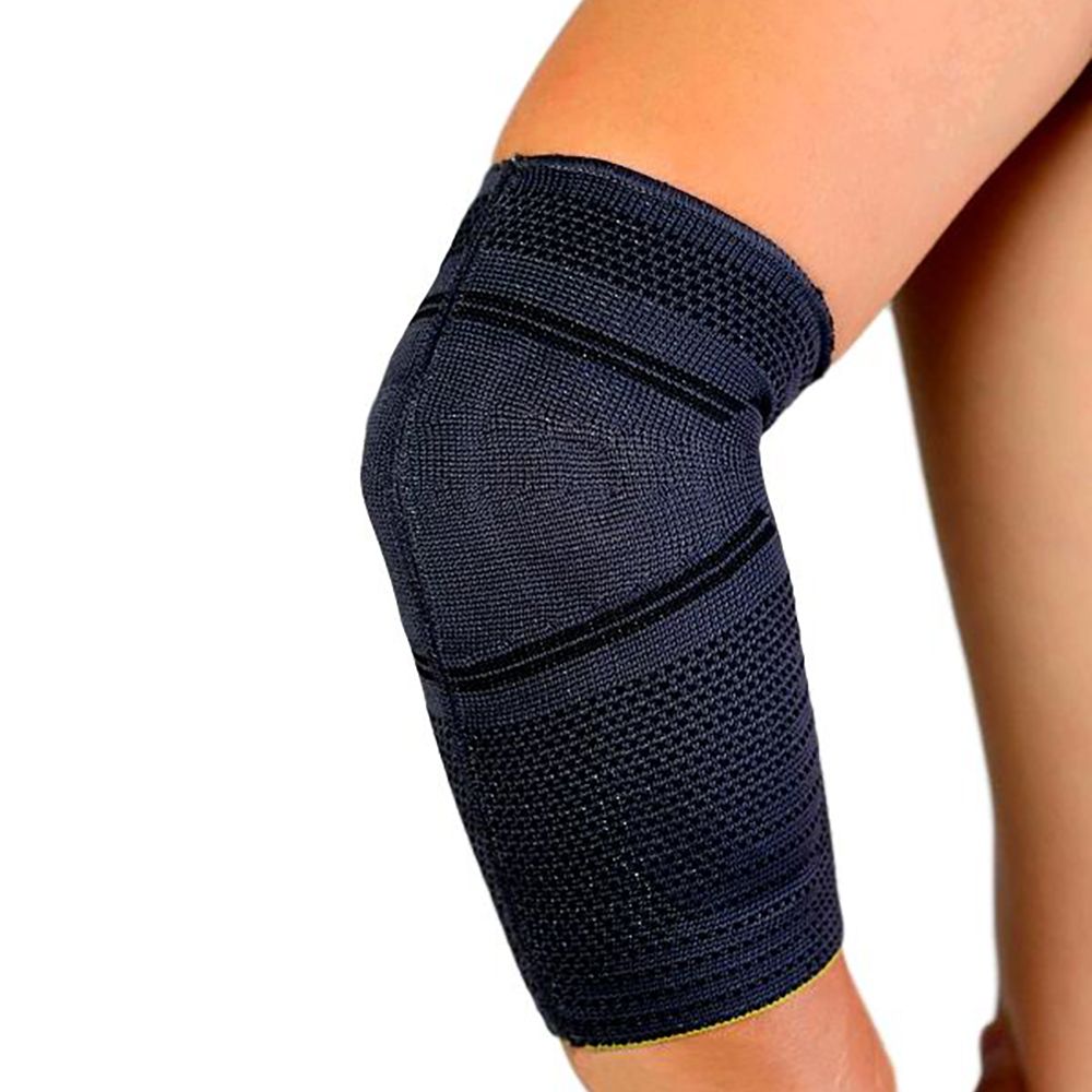 novamed premium comfort elbow support around right elbow arm besides body